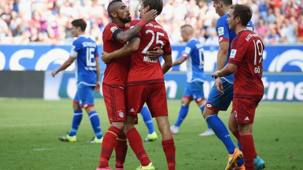 SINSHEIM, GERMANY - AUGUST 22: Thomas Mueller of Muenchen celebrates with his team-mates after scoring his team's first goal during the Bundesliga match between 1899 Hoffenheim and FC Bayern Muenchen at Wirsol Rhein-Neckar-Arena on August 22, 2015 in Sinsheim, Germany. (Photo by Matthias Hangst/Bongarts/Getty Images)