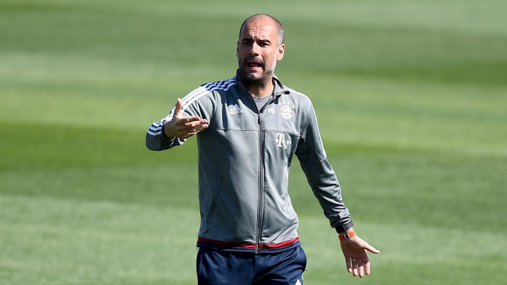 DOHA, QATAR - JANUARY 11: Head coach Josep Guardiola gestures during a training session at day six of the Bayern Muenchen training camp at Aspire Academ on January 11, 2016 in Doha, Qatar. (Photo by Lars Baron/Bongarts/Getty Images)