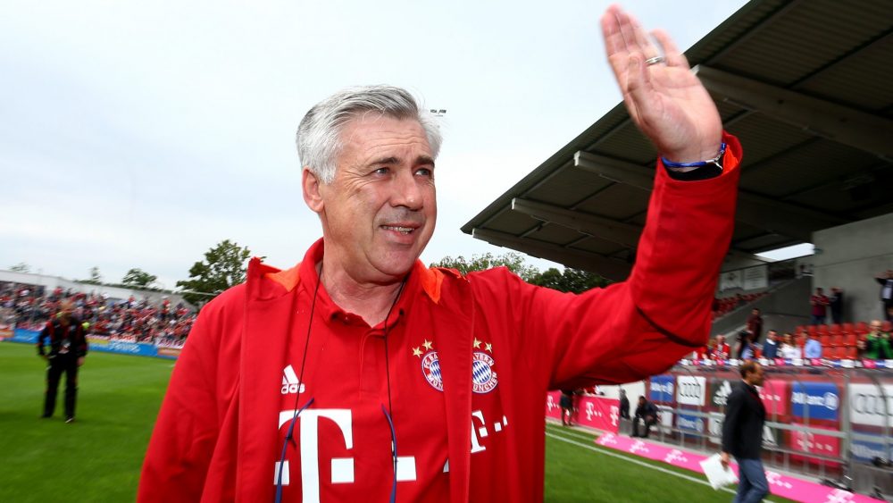 LIPPSTADT, GERMANY - JULY 16: Head coach Carlo Ancelotti of Bayern Muenchen welcomes the audience prior to the friendly match between SV Lippstadt and FC Bayern at Stadion am Bruchbaum on July 16, 2016 in Lippstadt, Germany. (Photo by Christof Koepsel/Bongarts/Getty Images)