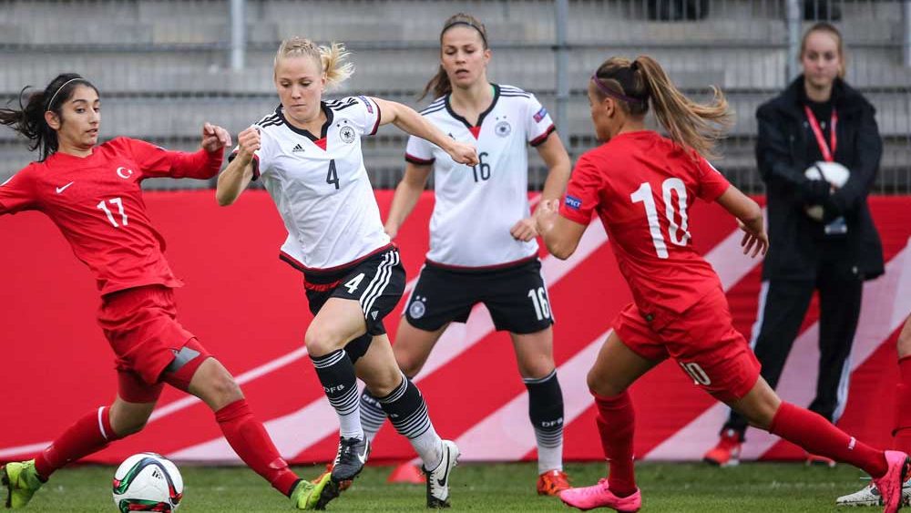 SANDHAUSEN, GERMANY - OCTOBER 25: Leonie Maier of Germany is challenged by Ipek Kaya of Turkey (L) during the UEFA Women's Euro 2017 Qualifier match between Germany and Turkey at Hardtwaldstadion on October 25, 2015 in Sandhausen, Germany