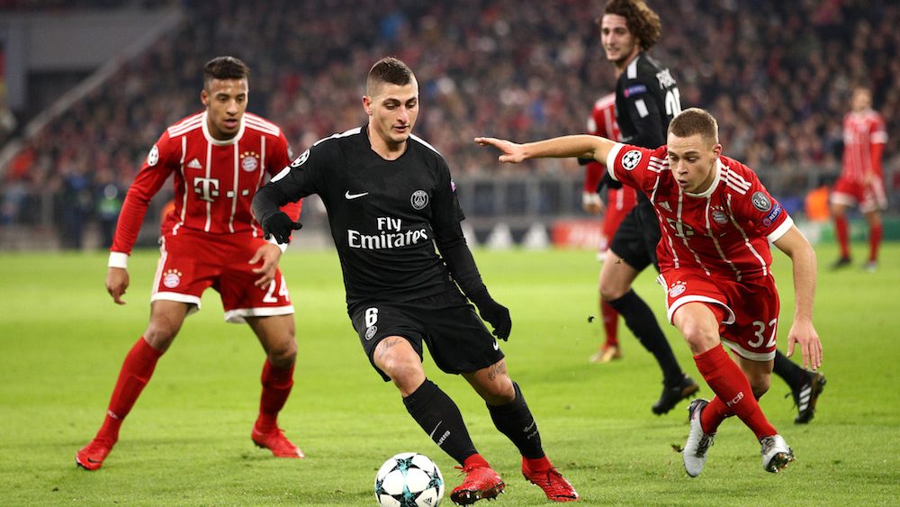 MUNICH, GERMANY - DECEMBER 05: Marco Verratti of PSG is challenged by Joshua Kimmich of Bayern Muenchen during the UEFA Champions League group B match between Bayern Muenchen and Paris Saint-Germain at Allianz Arena on December 5, 2017 in Munich, Germany. (Photo by Adam Pretty/Bongarts/Getty Images)