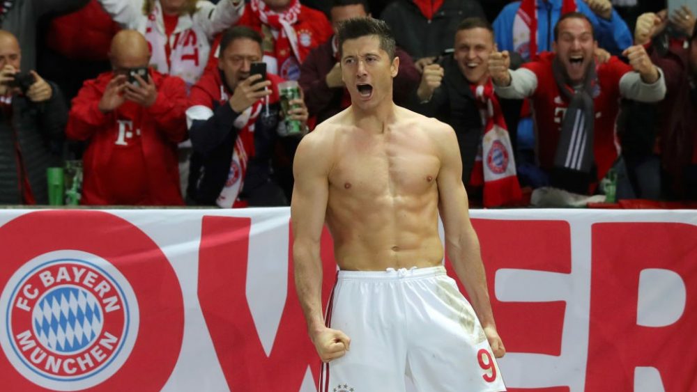 BERLIN, GERMANY - MAY 25: Robert Lewandowski of Bayern Munich celebrates after scoring his team's third goal during the DFB Cup final between RB Leipzig and Bayern Muenchen at Olympiastadion on May 25, 2019 in Berlin, Germany. (Photo by Alexander Hassenstein/Bongarts/Getty Images)