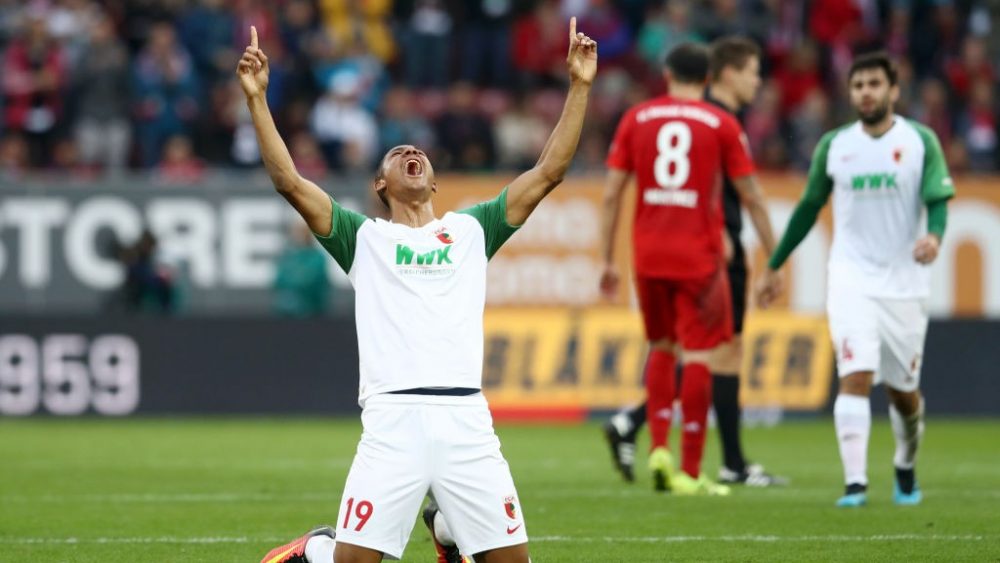 AUGSBURG, GERMANY - OCTOBER 19: Felix Uduokhai of FC Augsburg celebrates at full time during the Bundesliga match between FC Augsburg and FC Bayern Muenchen at WWK-Arena on October 19, 2019 in Augsburg, Germany. (Photo by Alexander Hassenstein/Bongarts/Getty Images)