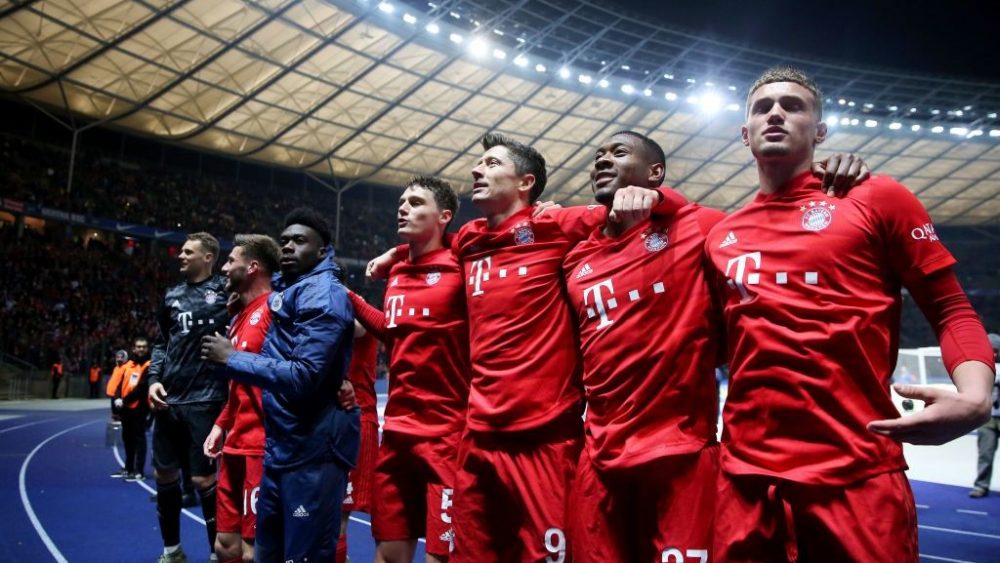 Bayern Munich players celebrate after the German first division Bundesliga football match Hertha Berlin v Bayern Munich in Berlin, on January 19, 2020. (Photo by RONNY HARTMANN / AFP) / DFL REGULATIONS PROHIBIT ANY USE OF PHOTOGRAPHS AS IMAGE SEQUENCES AND/OR QUASI-VIDEO (Photo by RONNY HARTMANN/AFP via Getty Images)